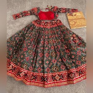 Red traditional indian wedding festive navratri garba lehenga chaniya choli